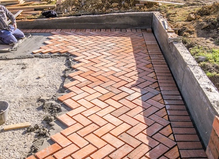 Why Is Proper Base Preparation Important for Paver Installation?
